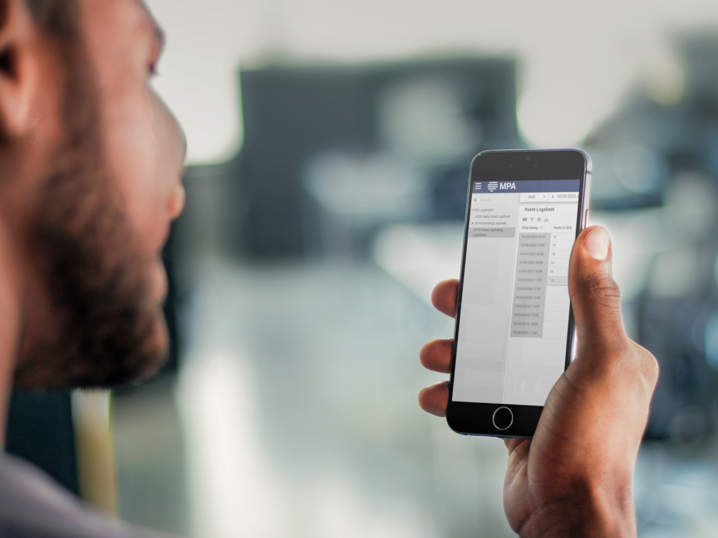 man using logsheets on iphone