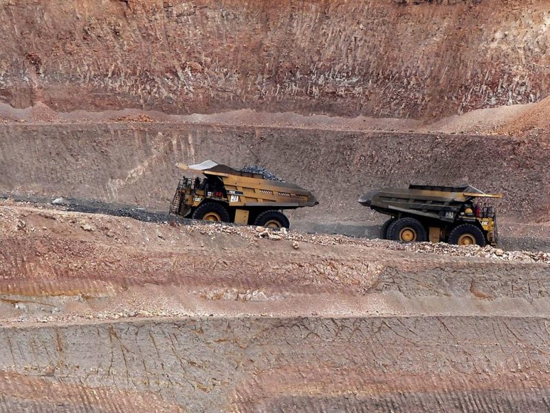 Two trucks on a mine site at West Musgrave